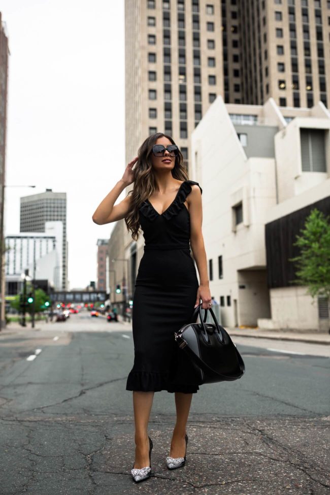 fashion blogger mia mia mine wearing a black two piece set from walmart