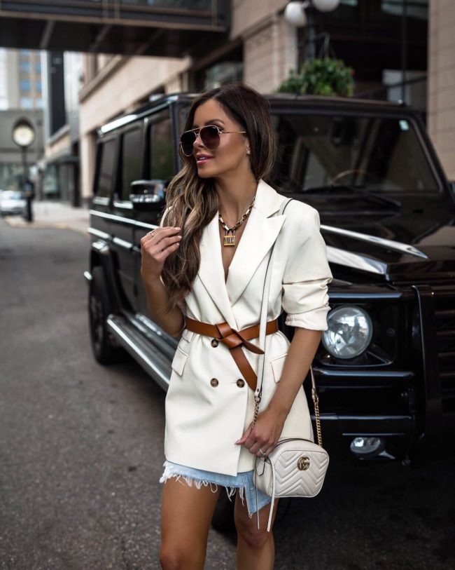 fashion blogger mia mia mine wearing a topshop white blazer with an agolde denim skirt