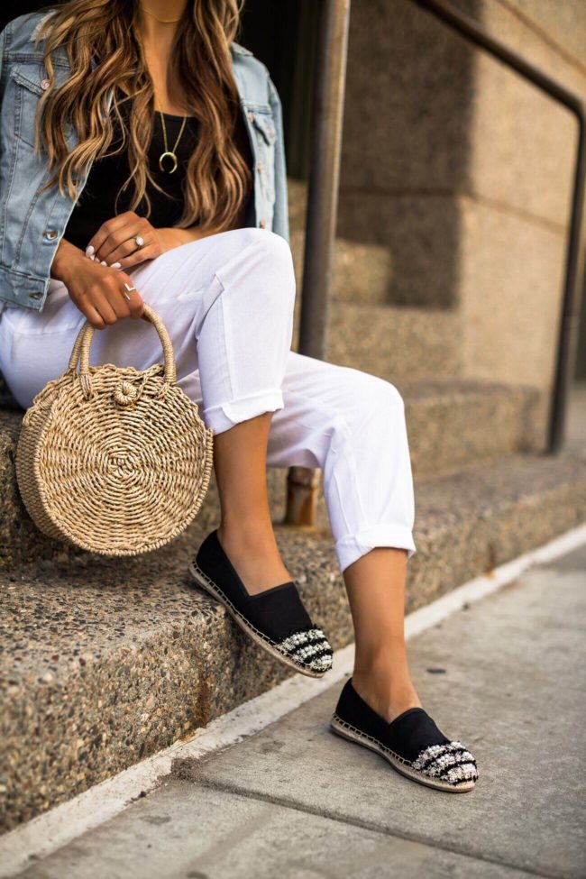 fashion blogger wearing black espadrilles and white linen pants from walmart