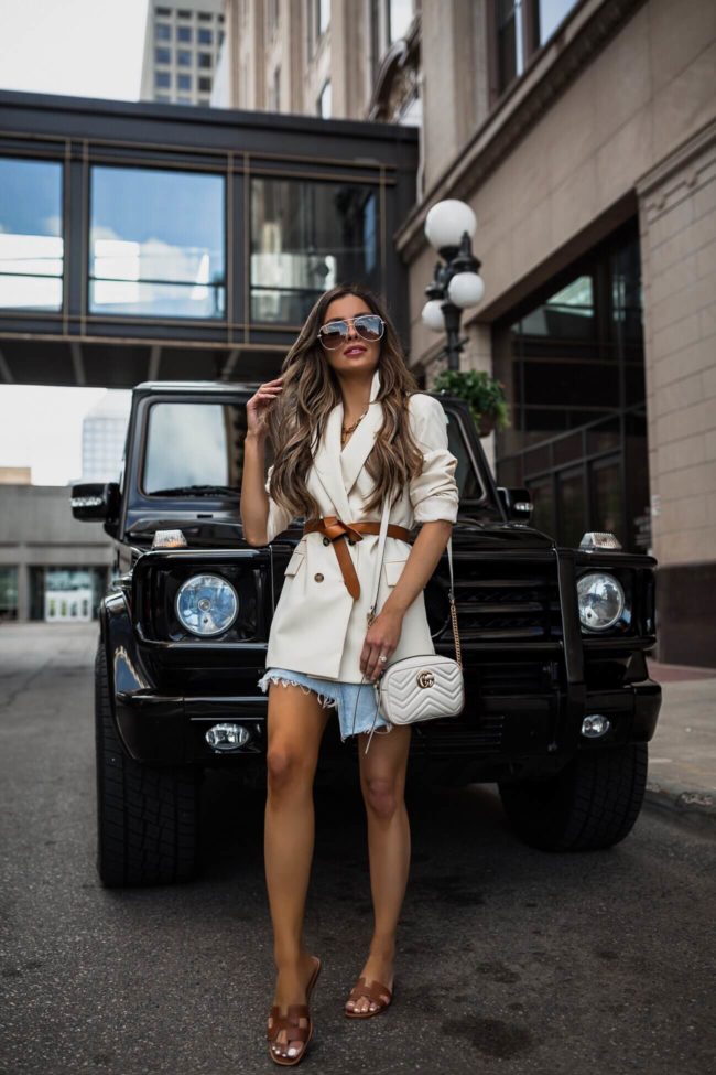 fashion blogger mia mia mine wearing a white topshop blazer and a gucci marmont bag