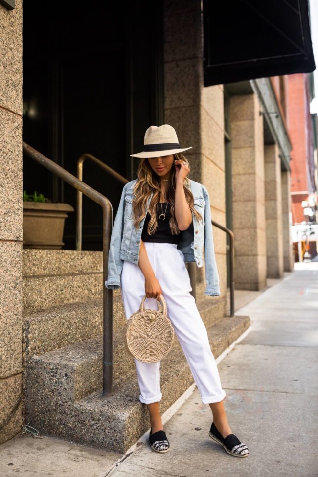fashion blogger mia mia mine wearing a denim crop jacket and white linen pants from walmart