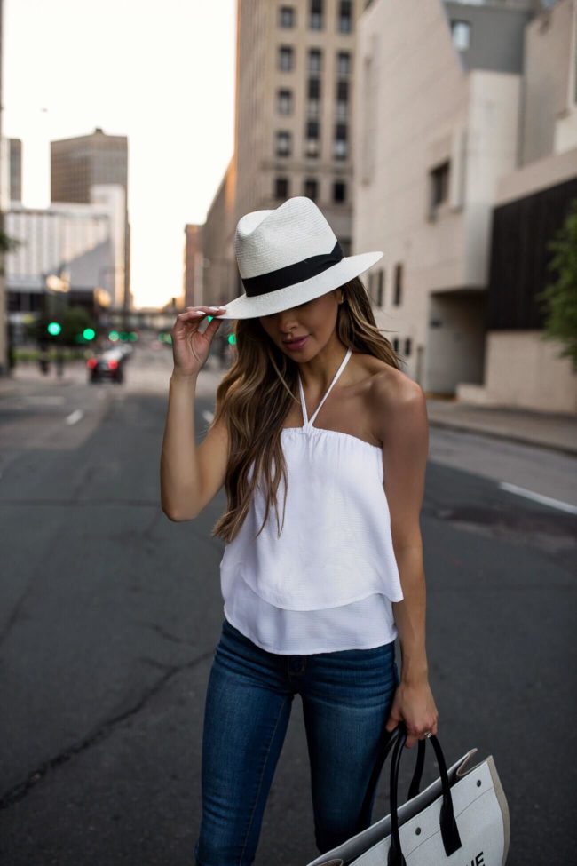 fashion blogger mia mia mine wearing a white top from walmart