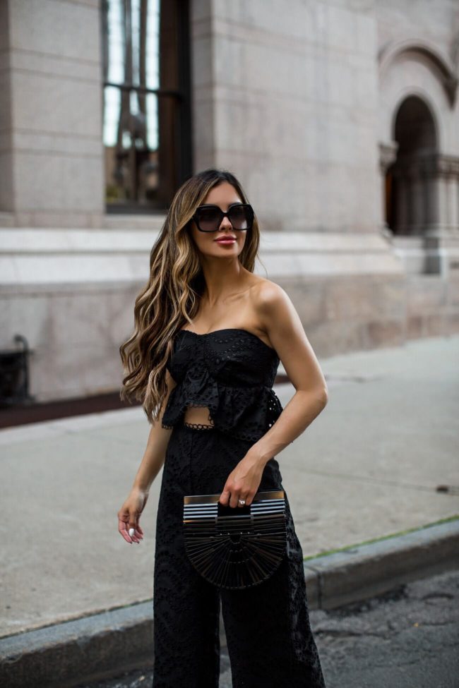 fashion blogger mia mia mine wearing an eyelet jumpsuit from topshop