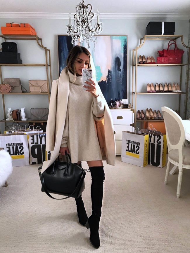 fashion blogger mia mia mine wearing a white coat and black over the knee stuart weitzman boots from the nordstrom anniversary sale 2019