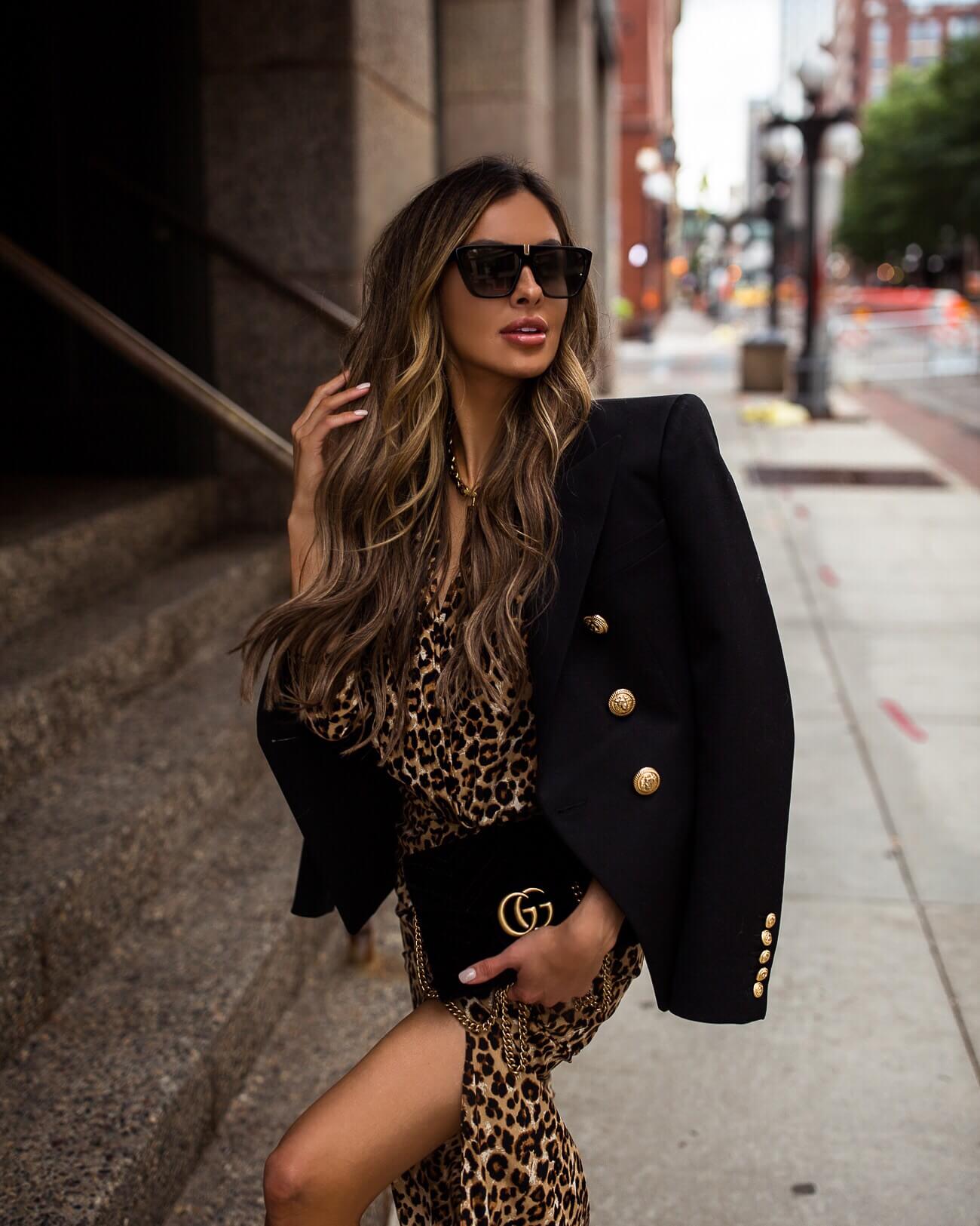 fashion blogger mia mia mine wearing a leopard veronica beard dress and a balmain blazer from nordstrom