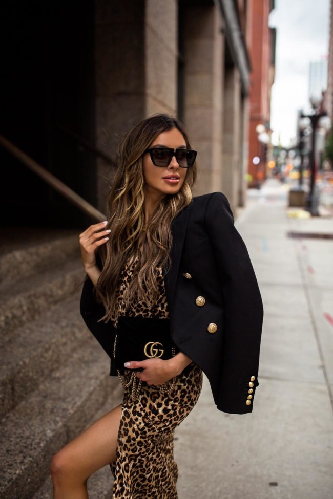 fashion blogger mia mia mine wearing a leopard dress for fall 2019