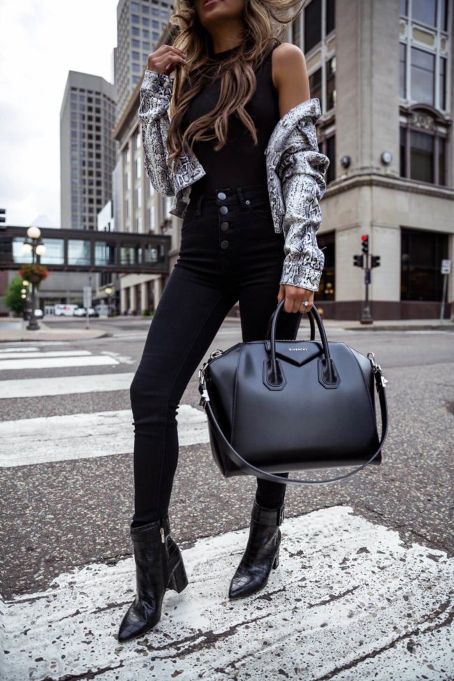 fashion blogger mia mia mine wearing black denim and black croc booties from walmart