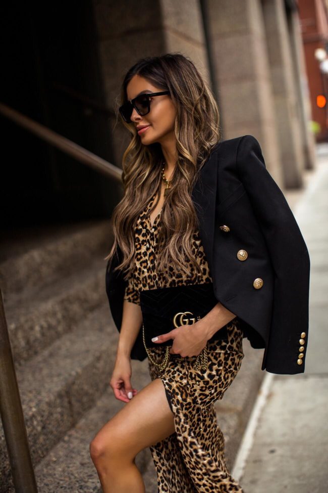 fashion blogger mia mia mine wearing a balmain blazer and a gucci marmont velvet bag