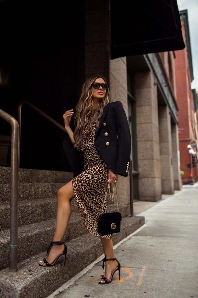 fashion blogger mia mia mine wearing a balmain blazer and a veronica beard leopard dress