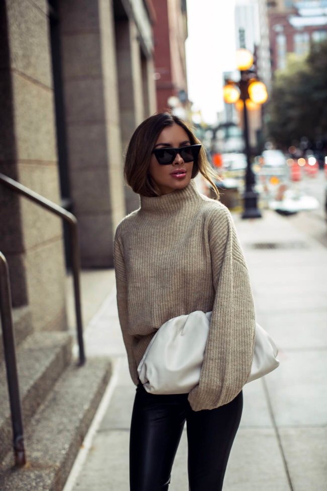 fashion blogger mia mia mine wearing a bottega veneta the pouch in mist