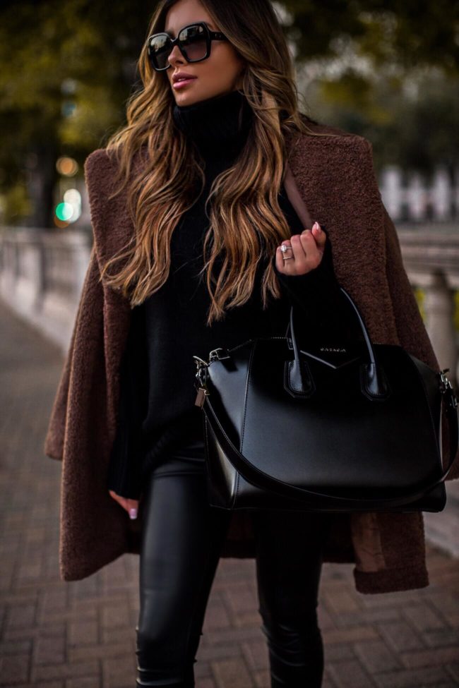 fashion blogger mia mia mine wearing an oversized sweater from walmart