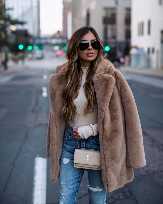 fashion blogger mia mia mine wearing teddy bear coat from revolve
