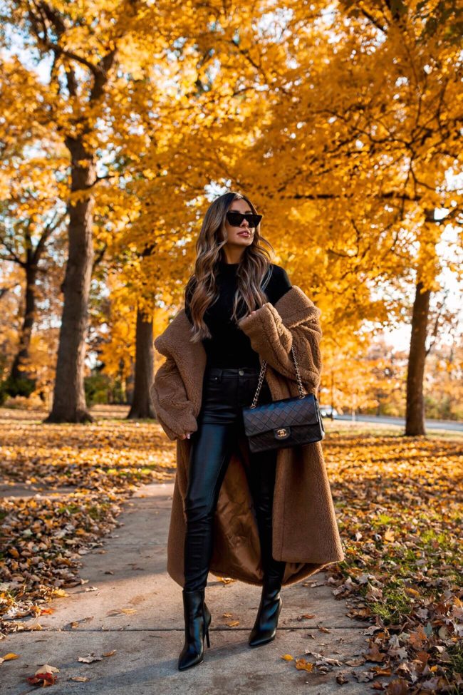 fashion blogger mia mia mine wearing a teddy bear coat by max mara and a chanel bag from ebay