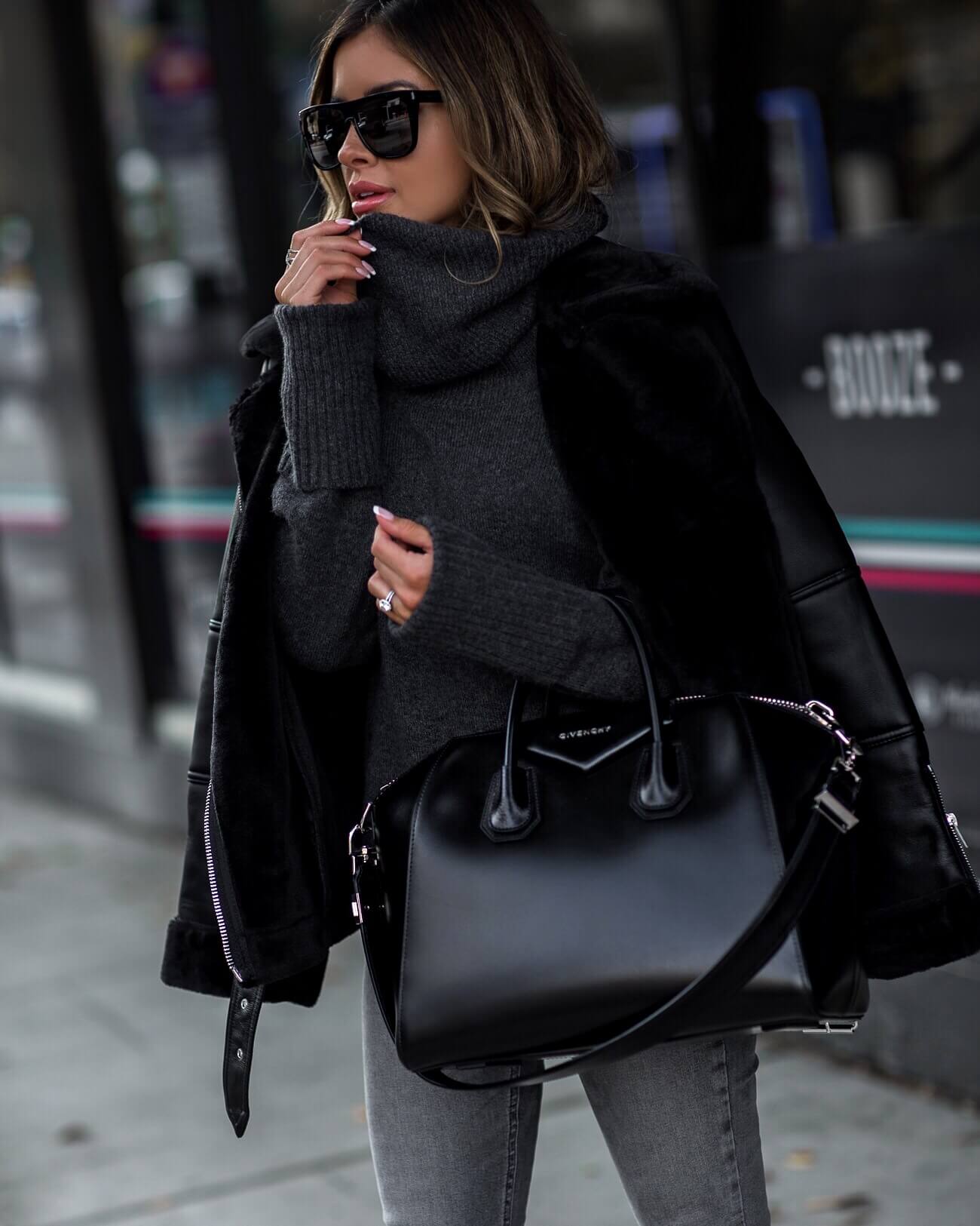fashion blogger mia mia mine wearing a givenchy bag and a topshop biker jacket