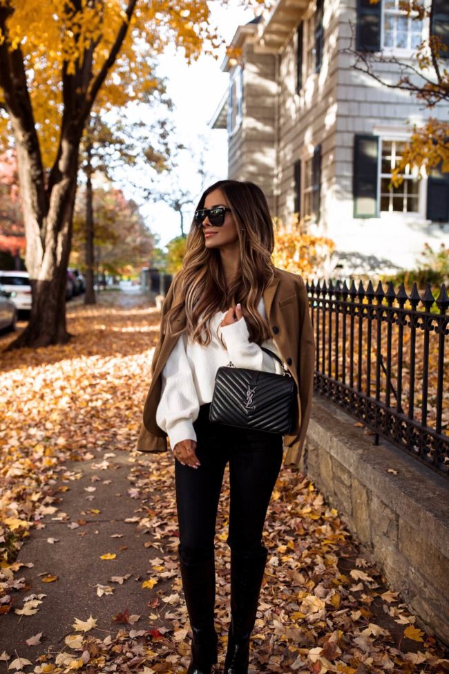 fashion blogger mia mia mine wearing a fall outfit from bloomingdale's
