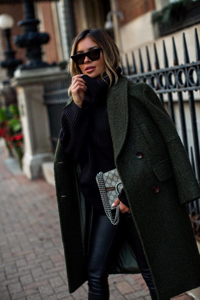 fashion blogger mia mia mine wearing a green coat from nordstrom and a gucci dionysus bag
