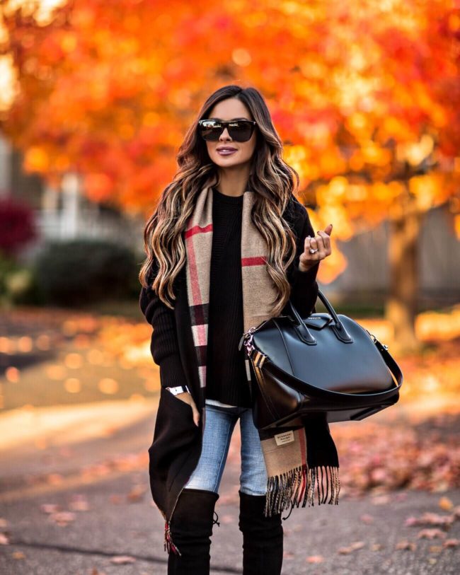 fashion blogger mia mia mine wearing a burberry scarf and a givenchy antigona bag