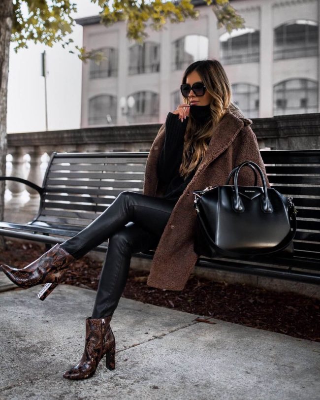 fashion blogger mia mia mine wearing snakeskin booties and a teddy coat from walmart