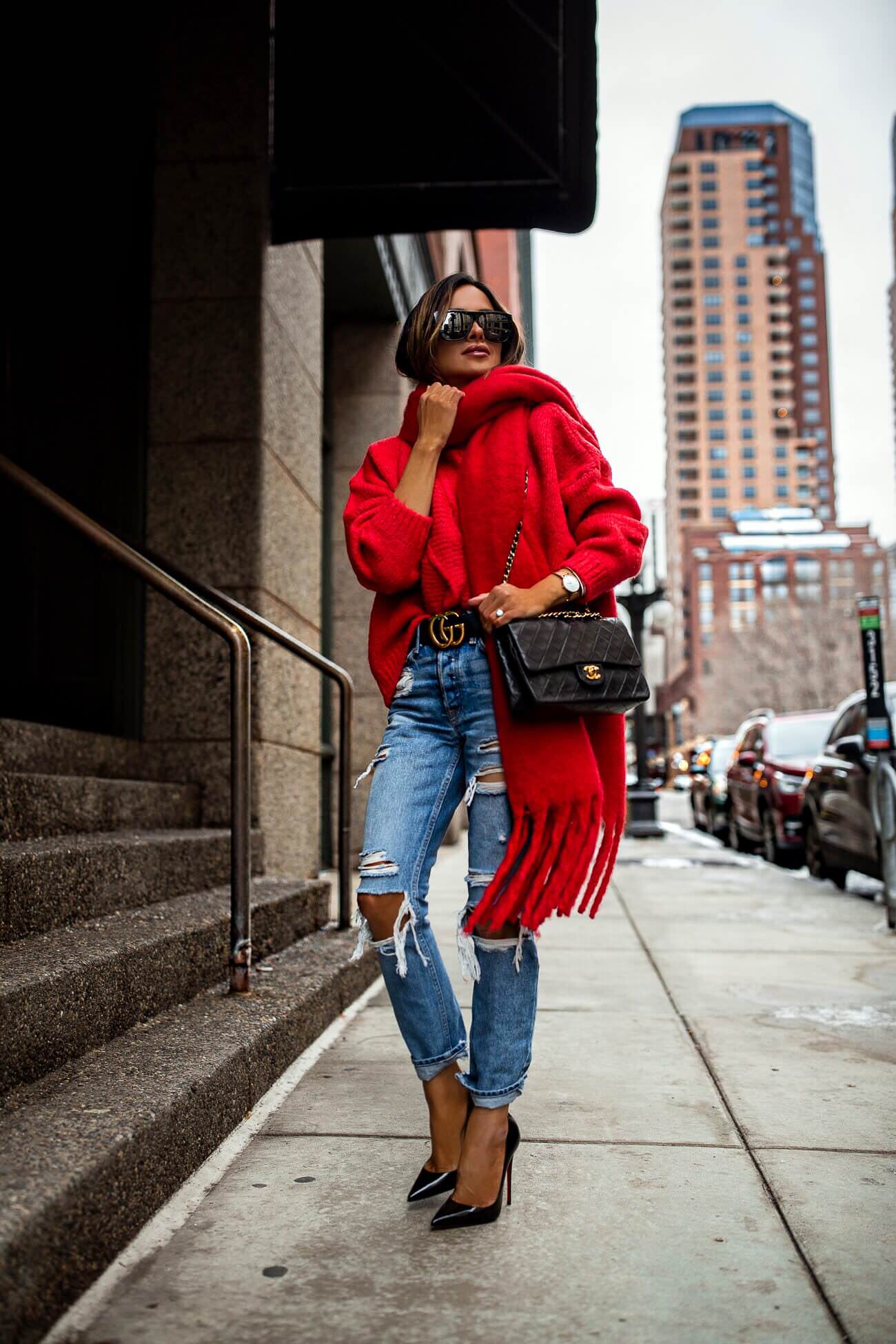 fashion blogger mia mia mine wearing a red sweater and red scarf with a gucci belt and chanel bag from ebay for holiday 2018
