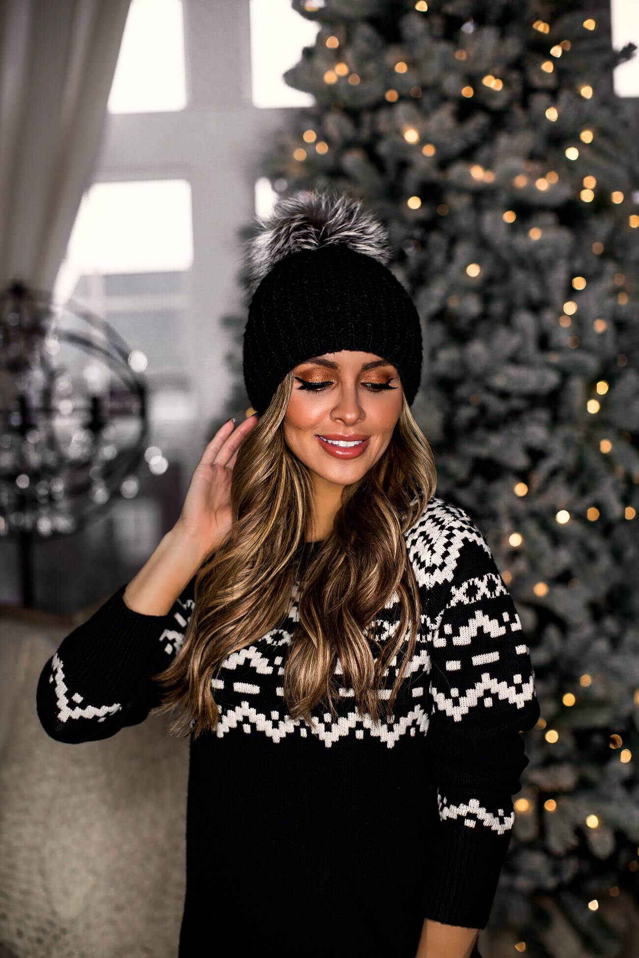 Fashion blogger wearing a scoop sweater dress from walmart for the holidays