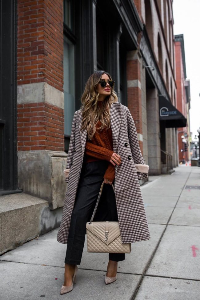 fashion blogger mia mia mine wearing a coat and trousers from petite studio