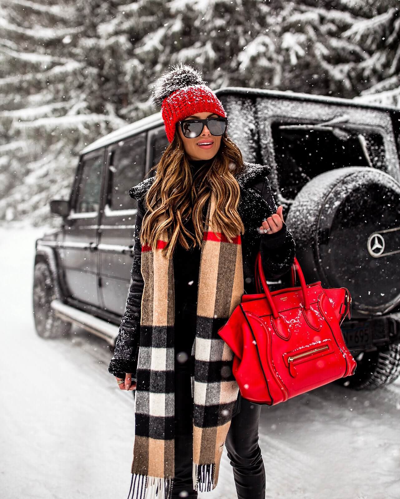 fashion blogger mia mia mine wearing a burberry scarf and celine bag for winter 2019