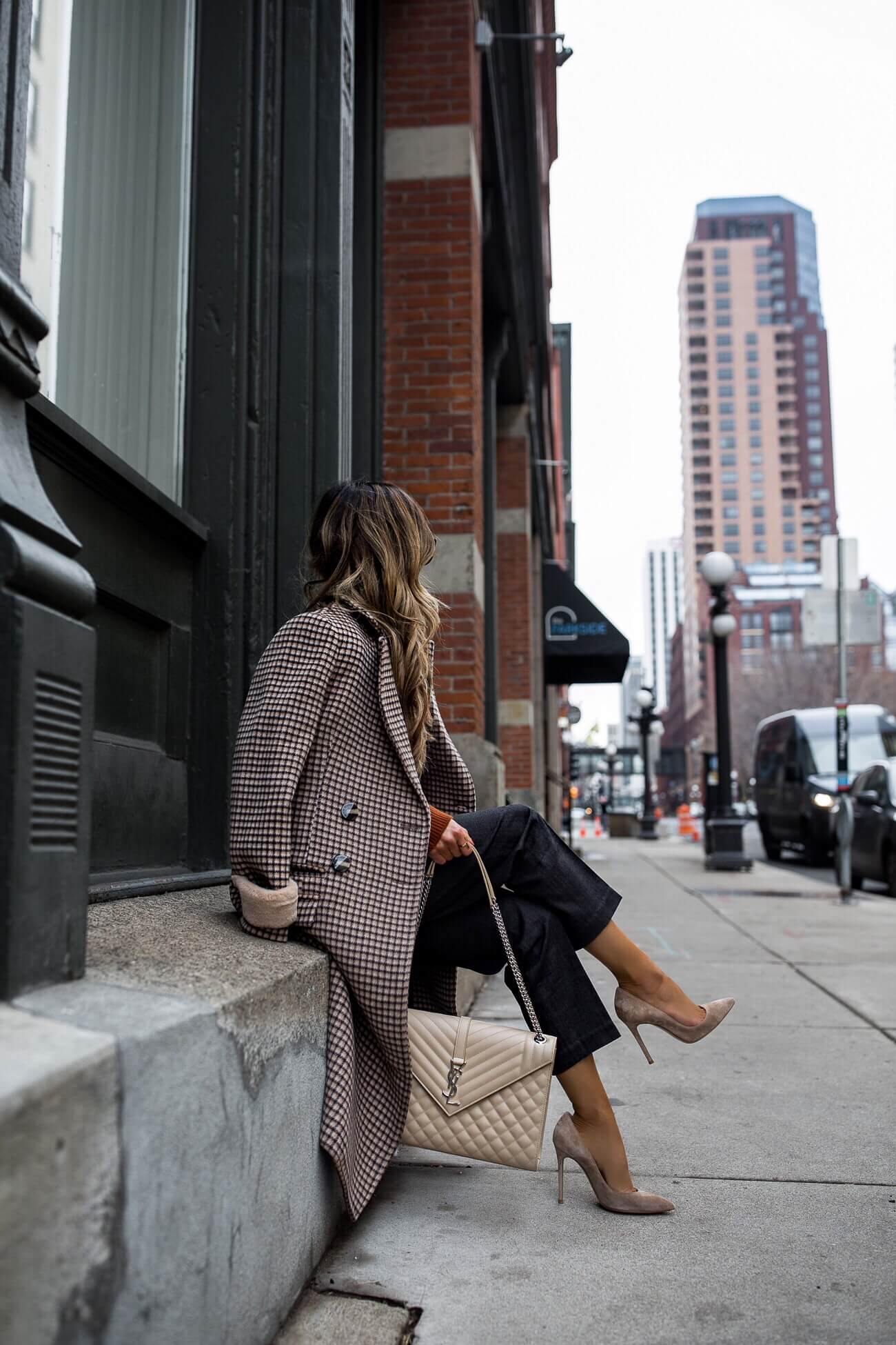 fashion blogger mia mia mine wearing a wool coat from petite studio and trousers for fall