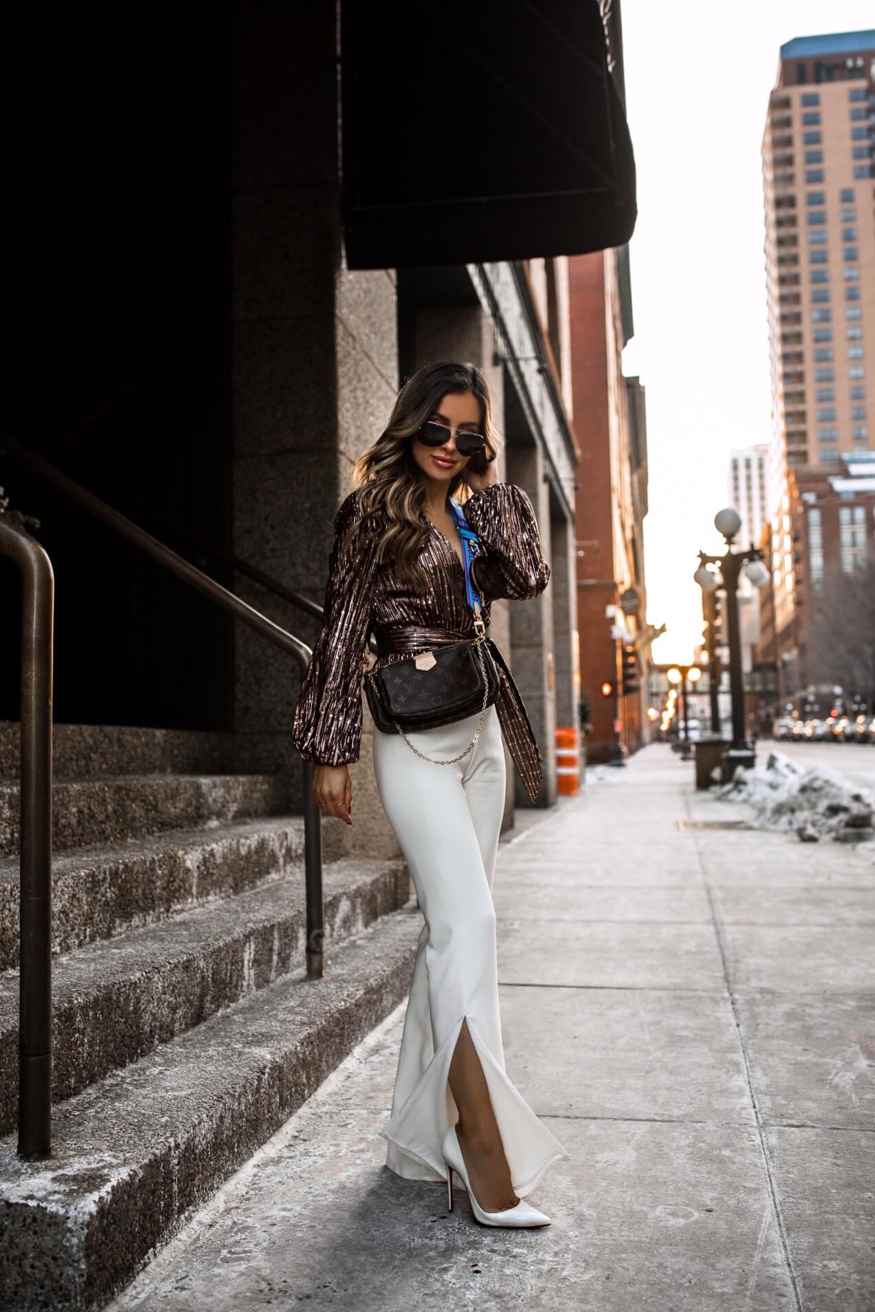 fashion blogger wearing a louis vuitton multi pochette from stockx