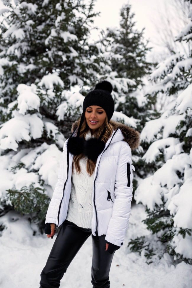fashion blogger mia mia mine wearing a white coat by SAM from bloomingdale