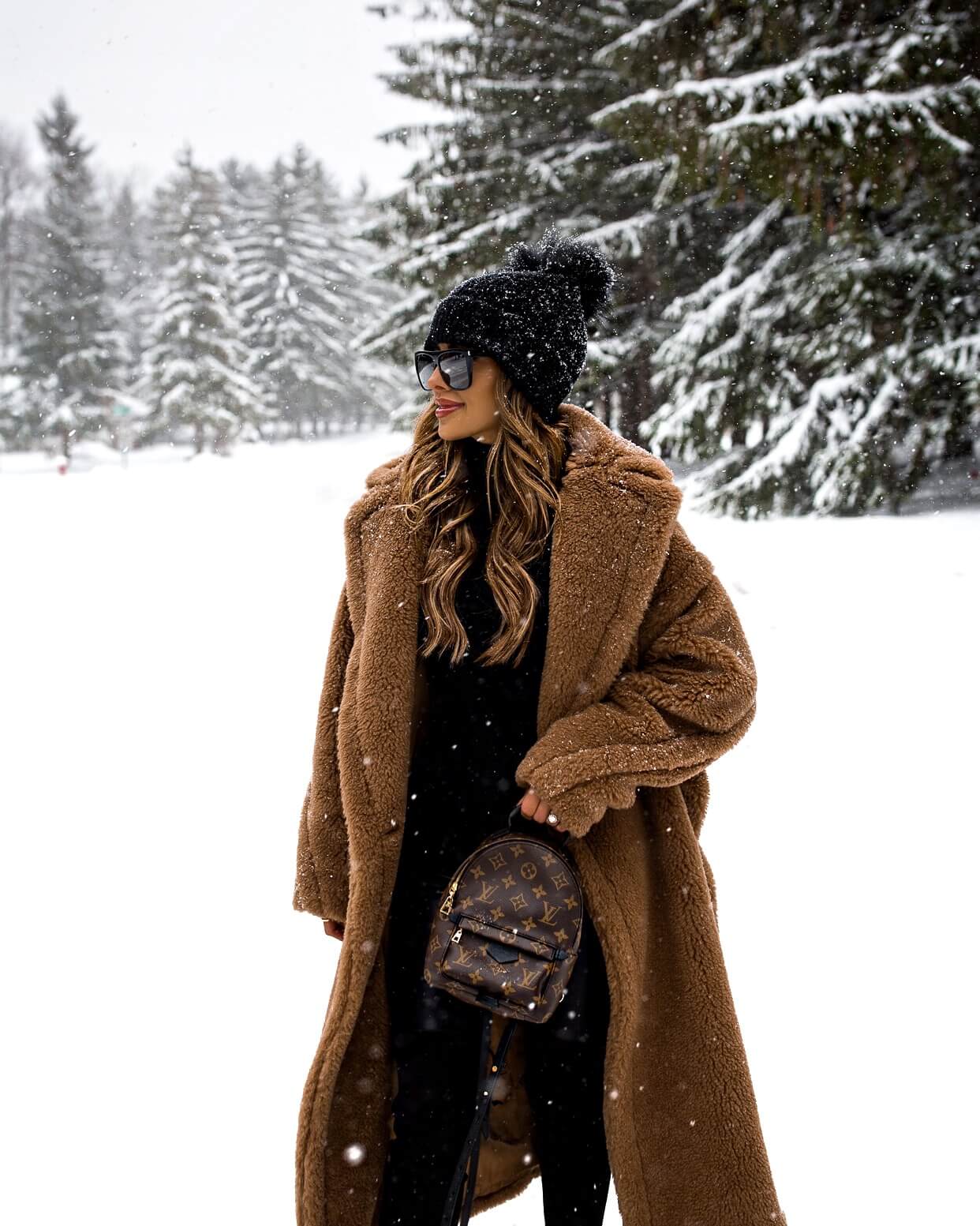 fashion blogger mia mia mine wearing a max mara teddy bear icon coat 