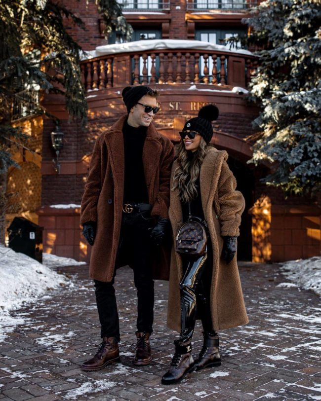 fashion blogger mia mia mine with husband phil in aspen wearing teddy bear coats