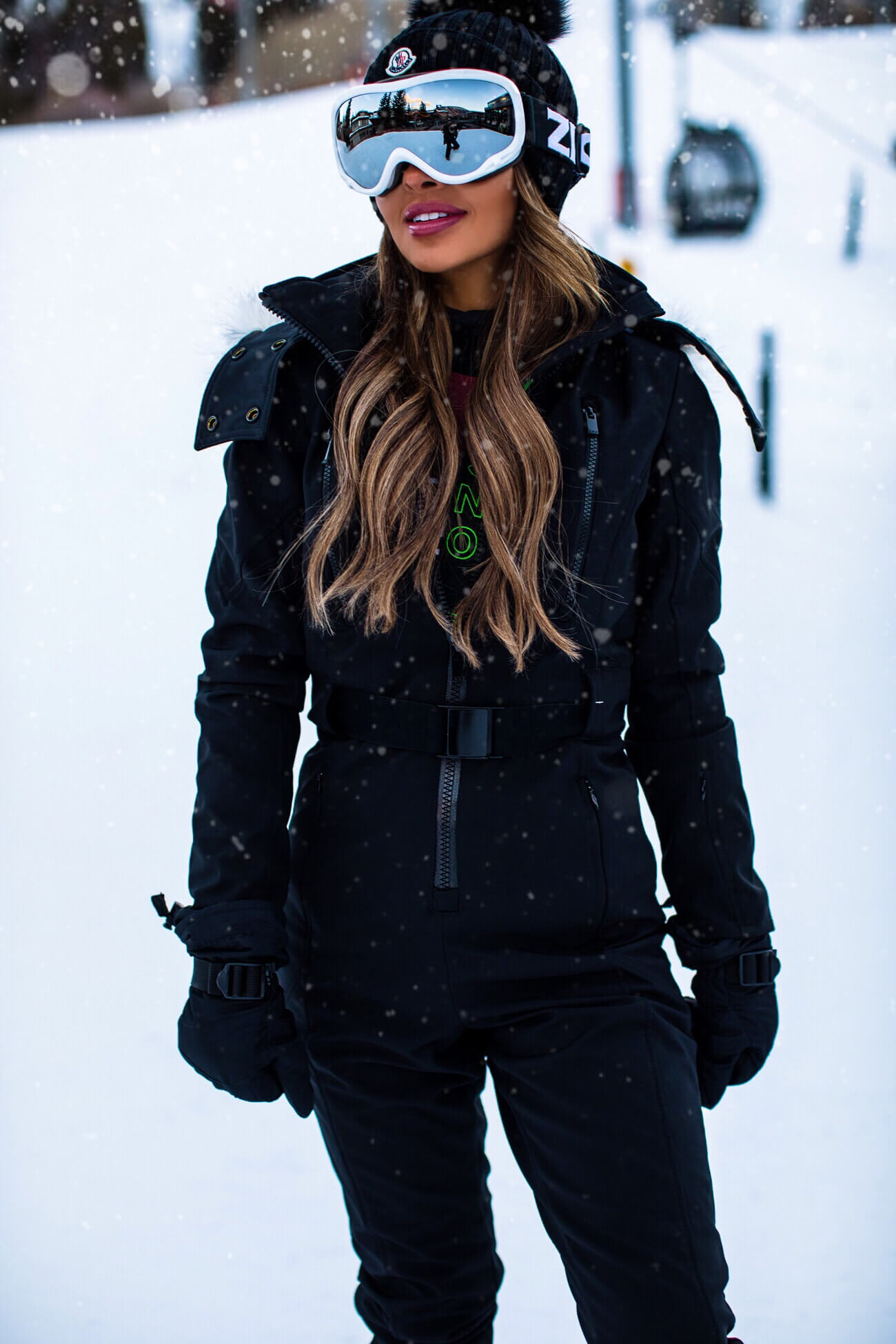 fashion blogger mia mia mine wearing a topshop sno outfit from nordstrom in aspen