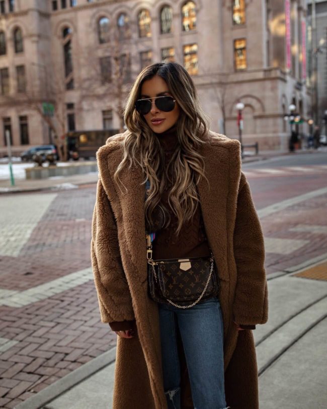 fashion blogger mia mia mine wearing a max mara teddy bear coat and louis vuitton multi pochette accessories