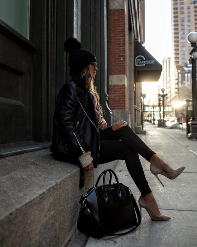 fashion blogger mia mia mine wearing a givenchy antigona bag and a moncler beanie for winter in st. paul minnesota