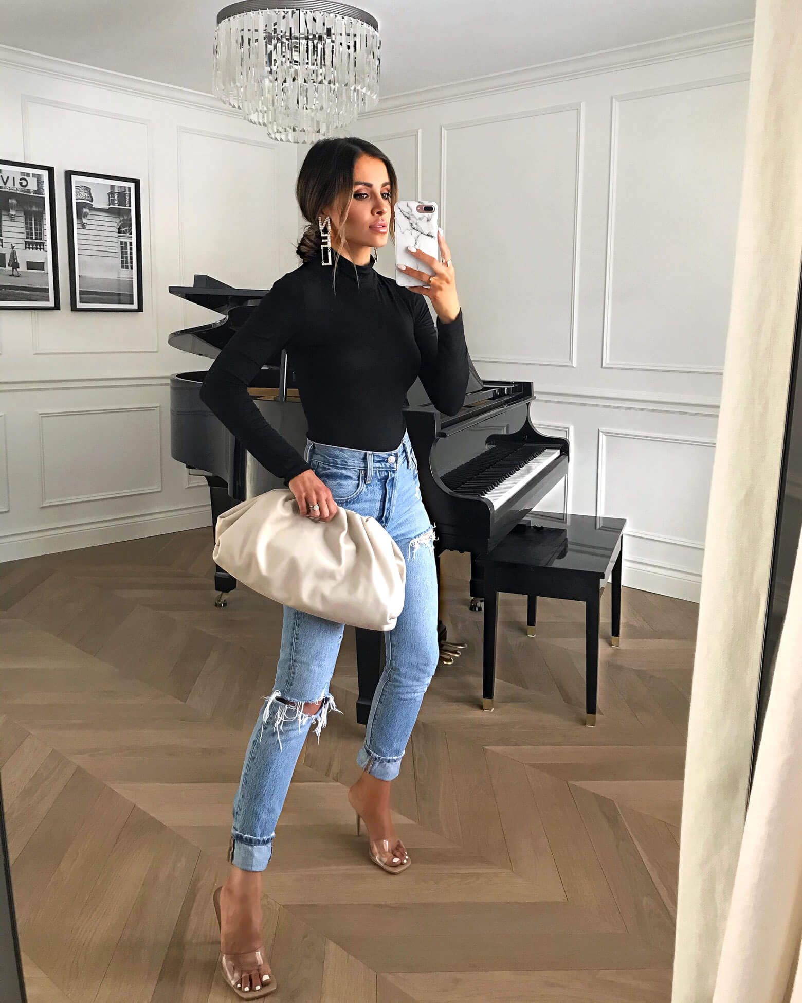 fashion blogger mia mia mine wearing a turtleneck bodysuit and steve madden heels