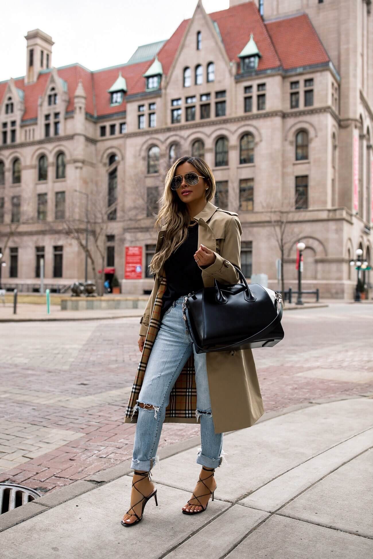 fashion blogger mia mia mine wearing a burberry trench coat for spring 2020