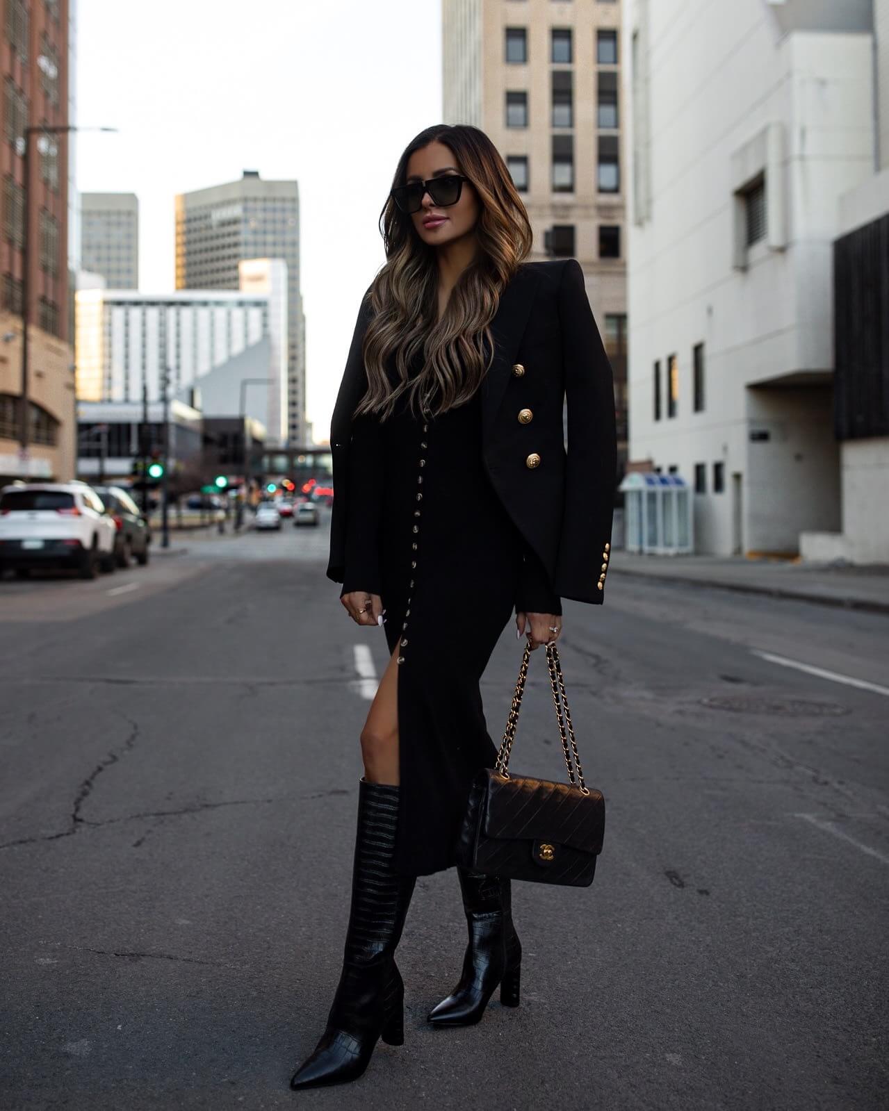 fashion blogger mia mia mine wearing a black sweater dress from amazon and a balmain blazer