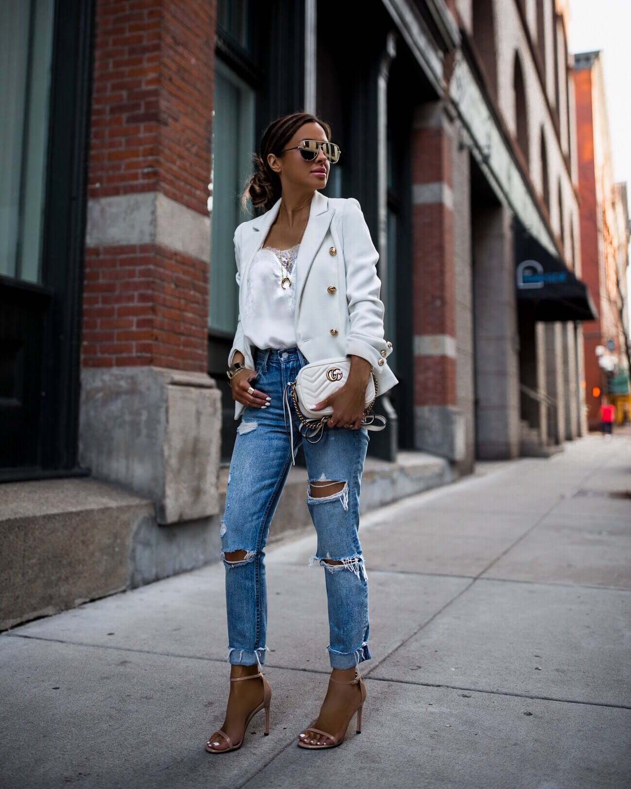 fashion blogger mia mia mine wearing a white blazer from the shopbop sale