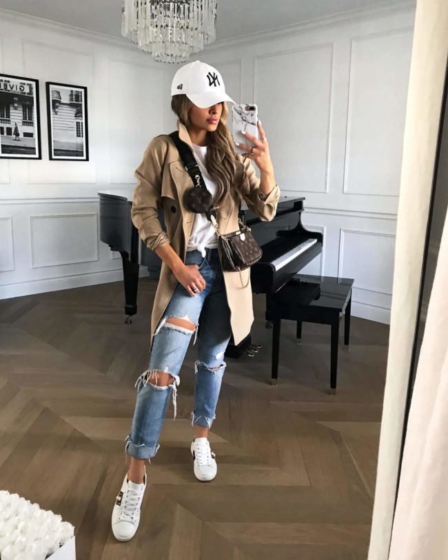 fashion blogger mia mia mine wearing an abercrombie trench coat and gucci sneakers