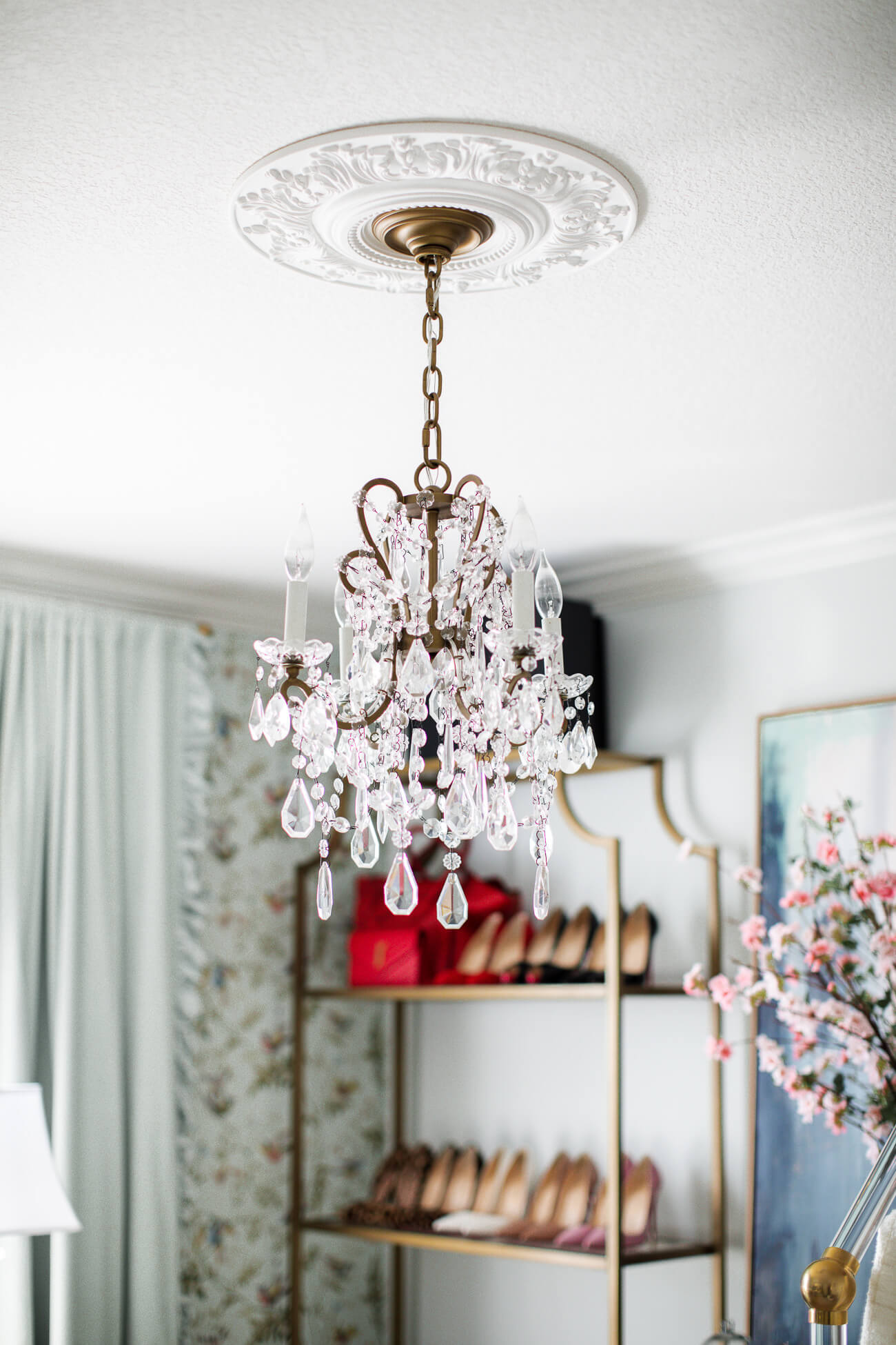 restoration hardware chandelier in fashion blogger's office