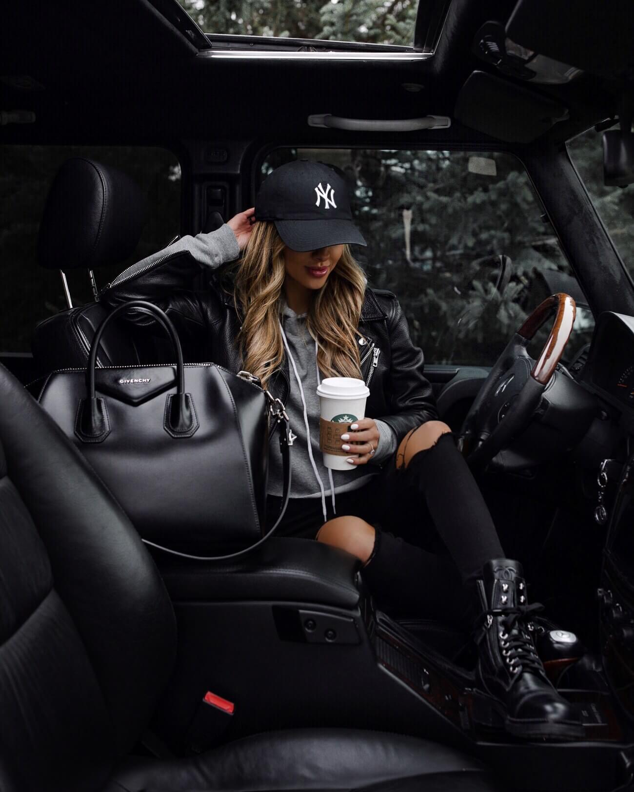 fashion blogger mia mia mine wearing chanel combat boots with a target hoodie