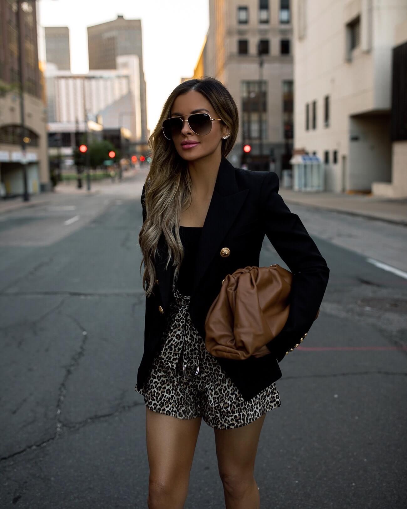 fashion blogger mia mia mine wearing leopard print shorts by marissa webb