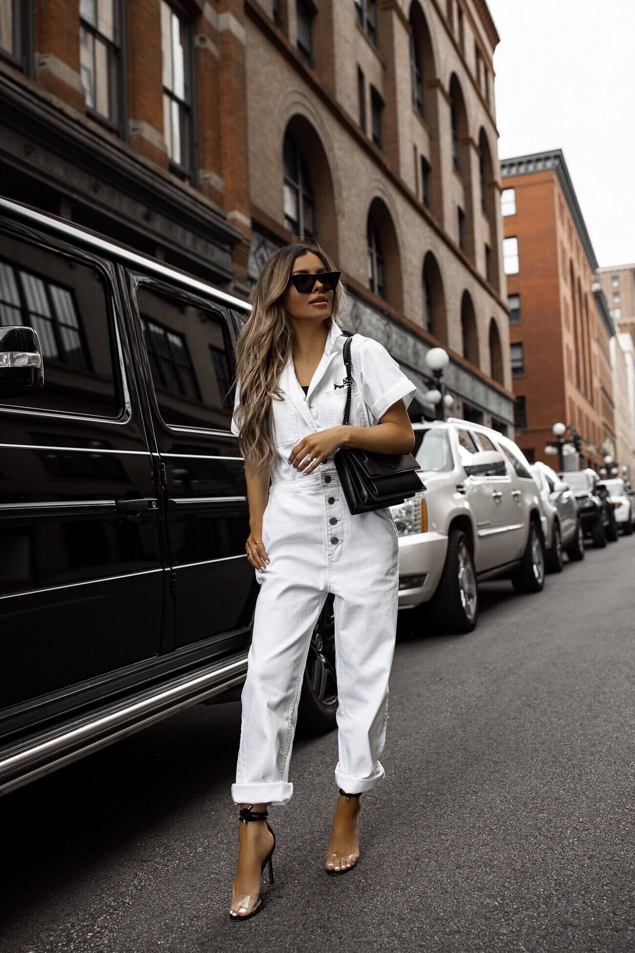 fashion blogger mia mia mine wearing a white jumpsuit from walmart