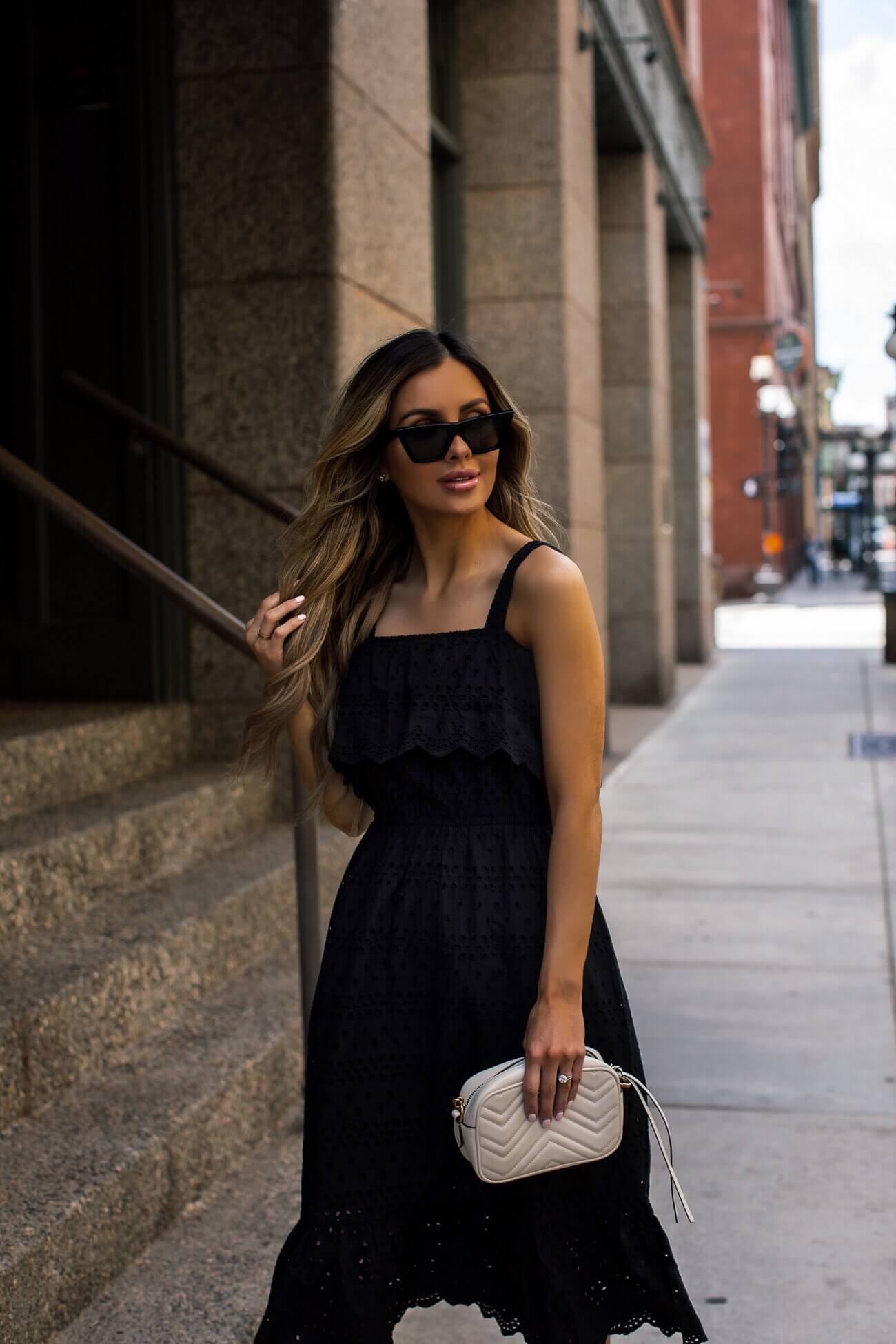 fashion blogger mia mia mine wearing a black dress from walmart