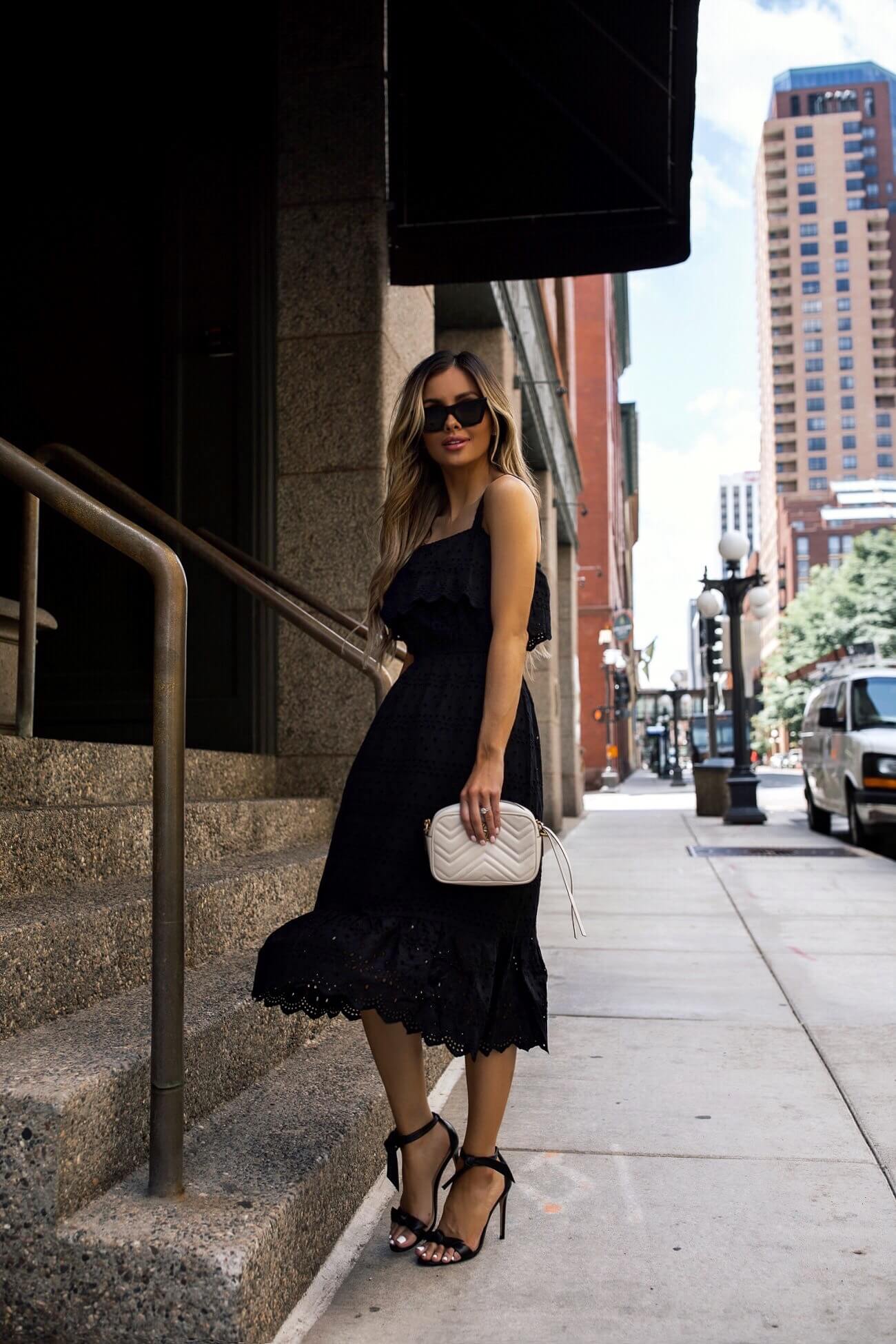 fashion blogger mia mia mine wearing an eyelet black dress from walmart
