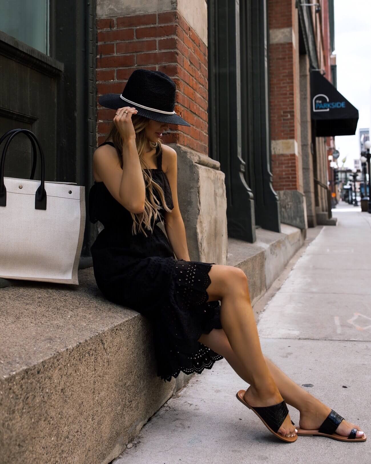 fashion blogger mia mia mine wearing a black dress from walmart for summer