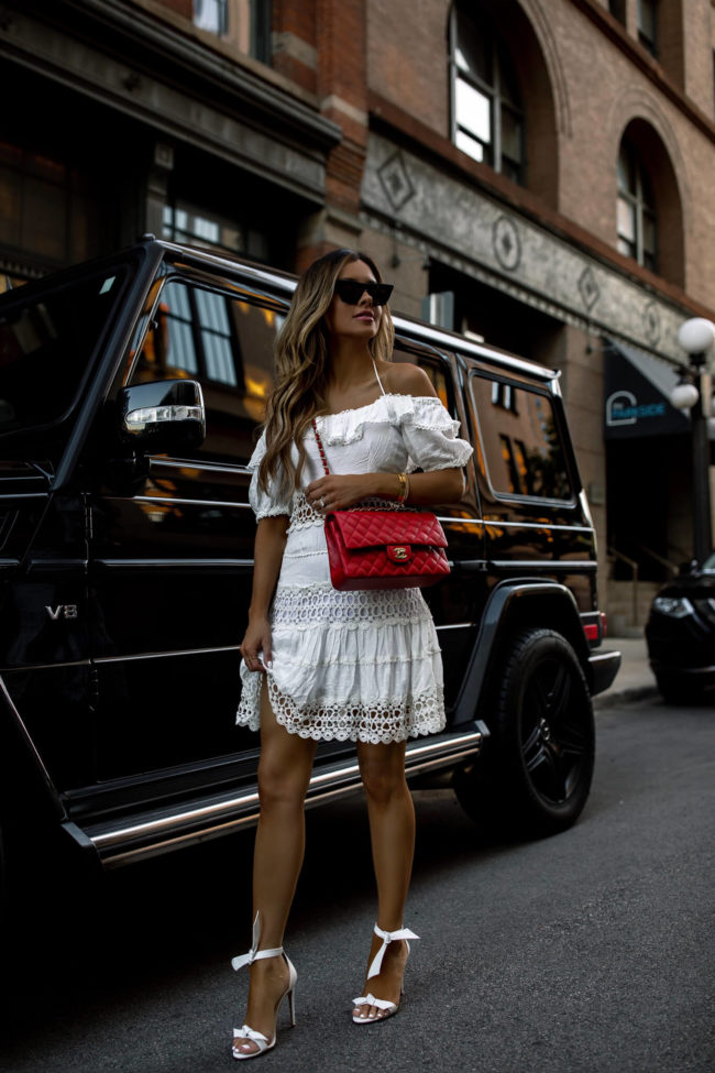fashion blogger mia mia mine wearing a white lace free people dress for summer