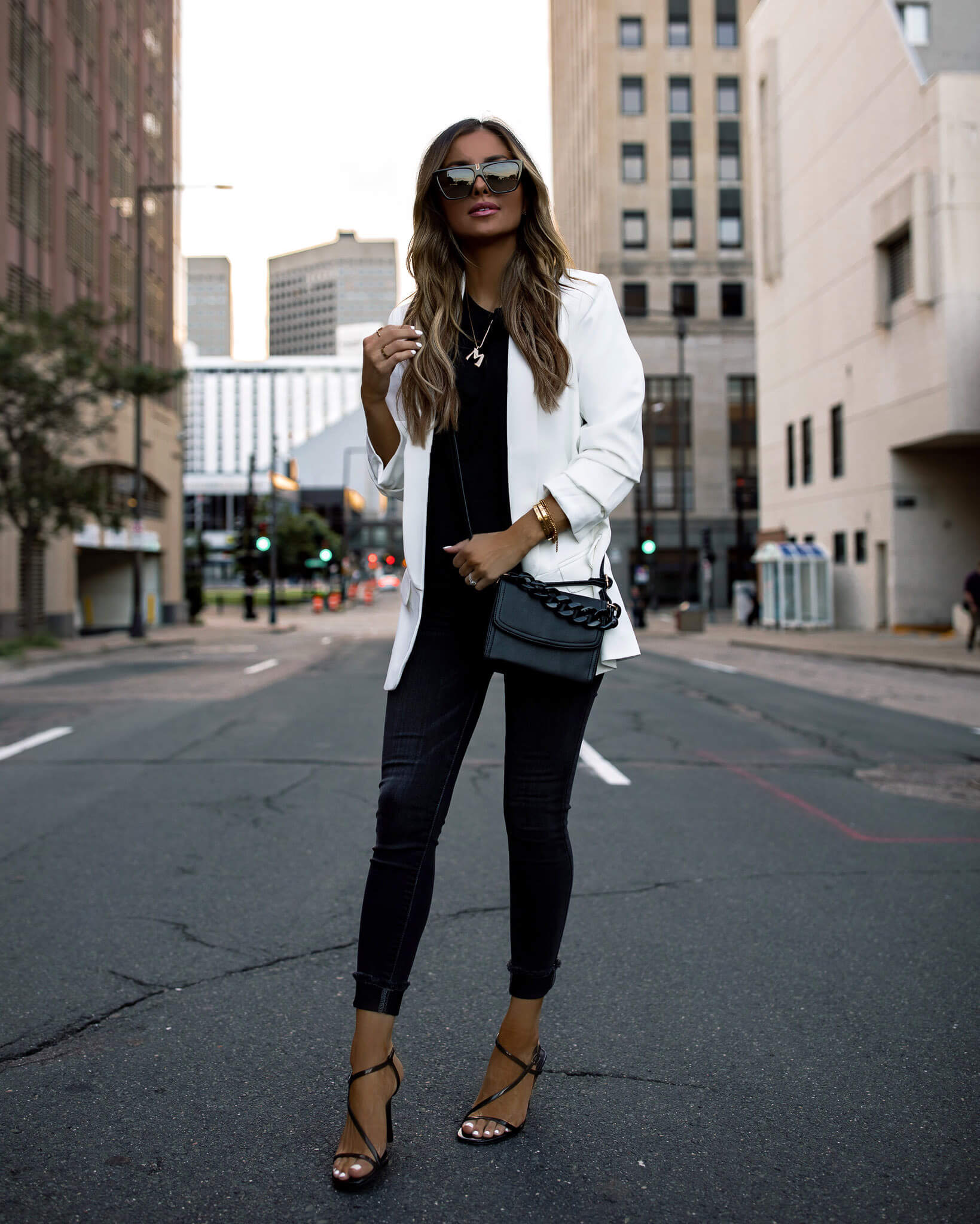 fashion blogger mia mia mine wearing a white blazer from walmart