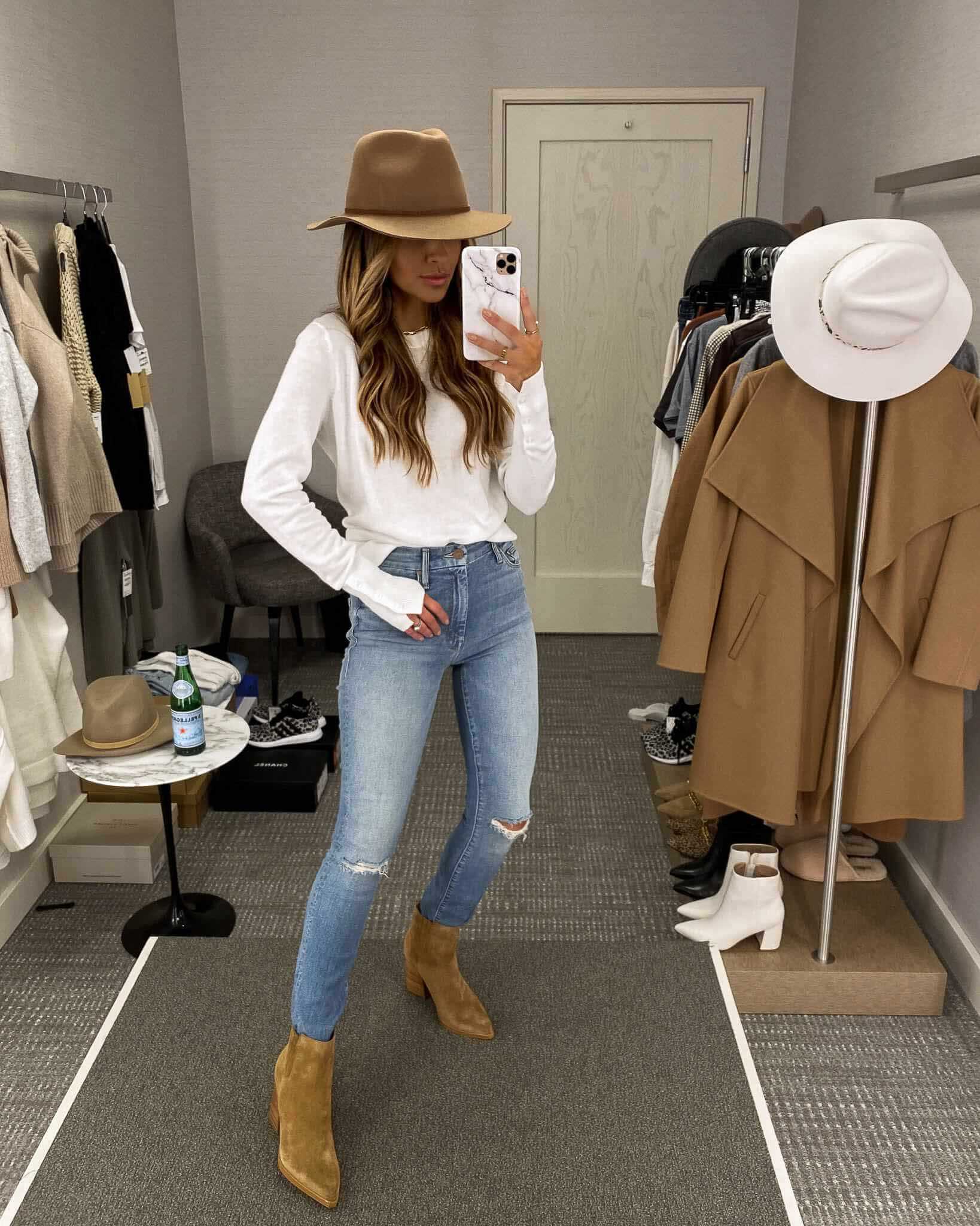 fashion blogger mia mia mine wearing a white sweater and brixton hat from the nordstrom annviersary sale
