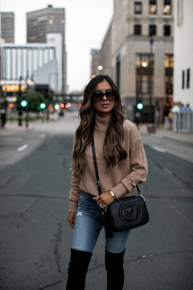 mia mia mine wearing a camel sweater for fall 2020